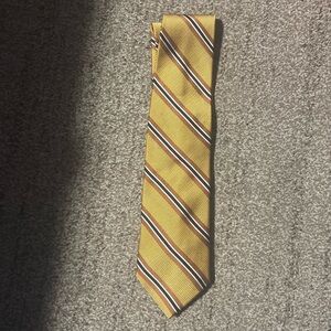 Jos. A Bank gold with rust, black and white stripes silk tie